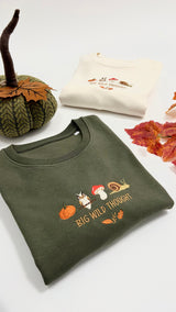 Cosy Autumn embroidered pumpkin, owl, toadstool and snail design by Big Wild Thought, folded flat lay