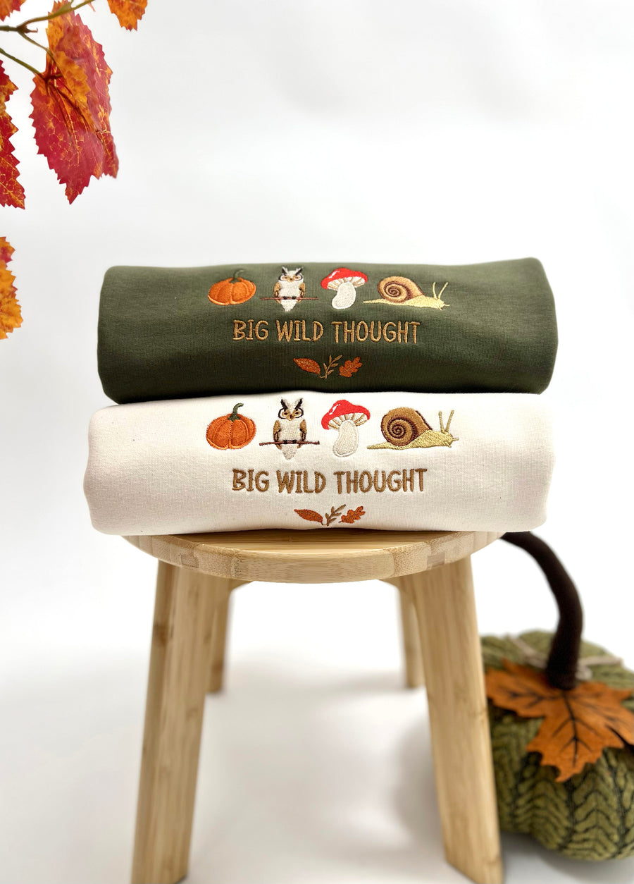 Cosy Autumn embroidered pumpkin, owl, toadstool and snail design by Big Wild Thought, folded flat lay