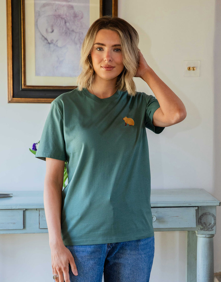 Capybara embroidered organic cotton t-shirt in Dusky Green, worn by a model
