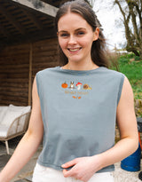 Cosy Autumn embroidered unisex sleeveless tee in Washed Blue, with a pumpkin, owl, toadstool and snail design