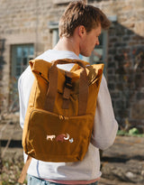 Extinct Embroidered Fold-Top Backpack