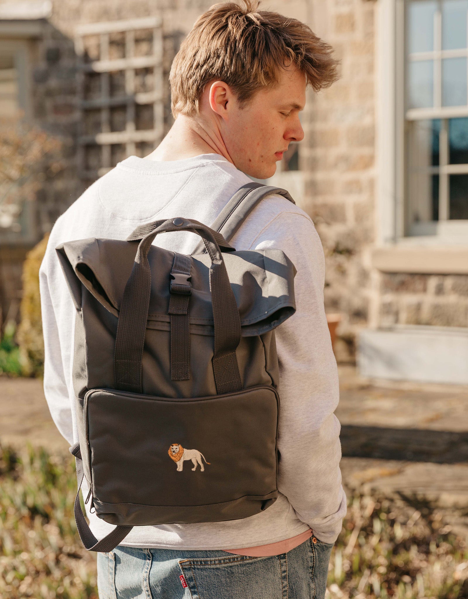 Lion Embroidered Fold-Top Backpack