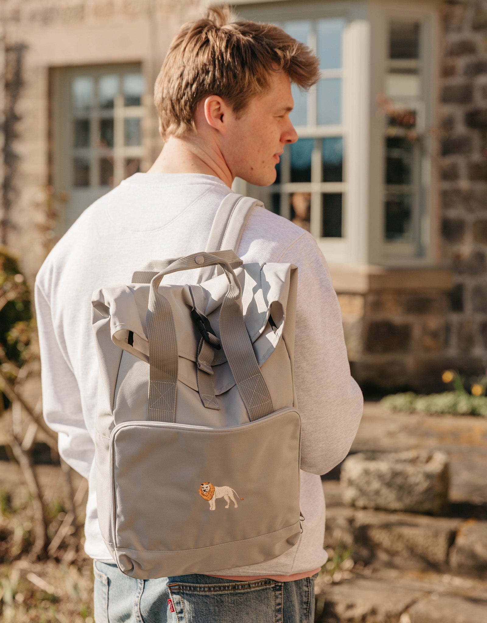 Lion Embroidered Fold-Top Backpack